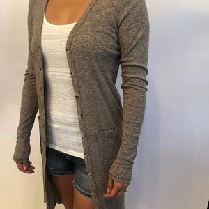 Calf length sweater.